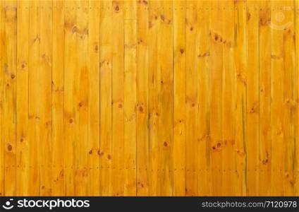 Texture of new varnished wooden fence surface