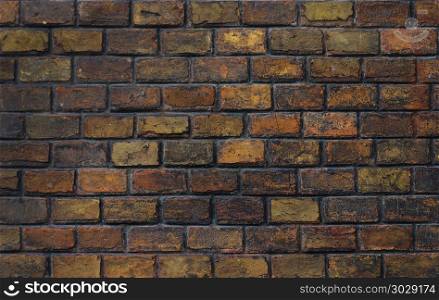 Texture of old dark brick wall surface. Old dark brick wall