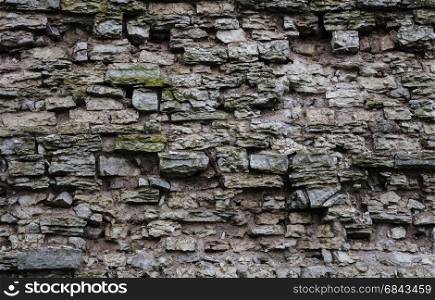 Texture of old destroyed gray brick wall