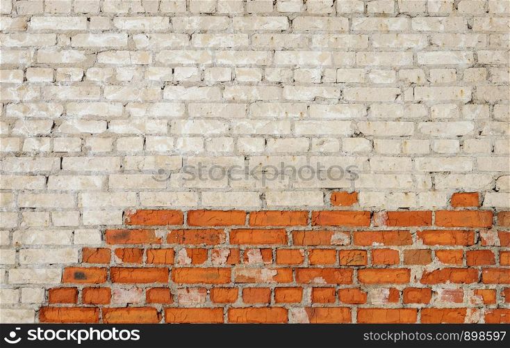 Texture of old red and white brick wall surface