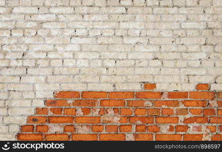 Texture of old red and white brick wall surface