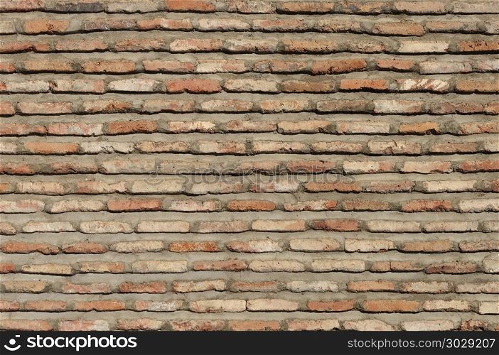 Texture of old vintage brick wall in Tbilisi, Georgia. Old brown brick wall background