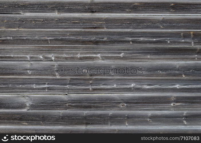 Texture of old weathered natural wooden planked wall