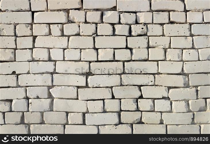 Texture of old white brick wall surface