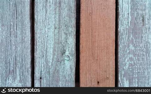Texture of old wooden fence close-up. Texture of old wooden fence