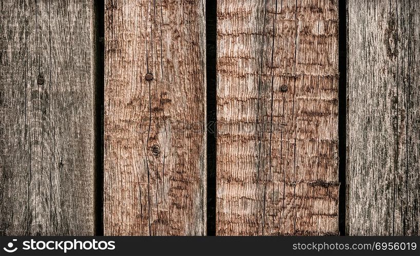 Texture of old wooden fence, close-up vintage background