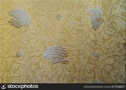 Texture of pale yellow paper wallpaper with abstract pattern