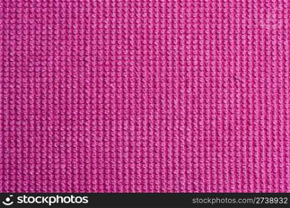 Texture of pink fabric background closeup