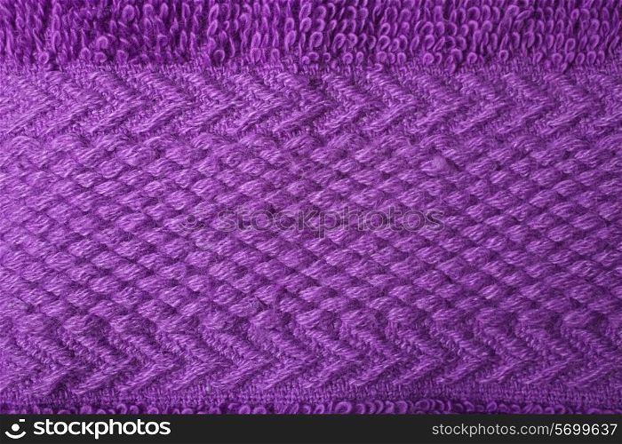 Texture of purple terry towels pattern closeup