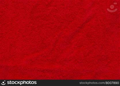 Texture of red fabric. Texture red of soft tissue fibers. Close-up.
