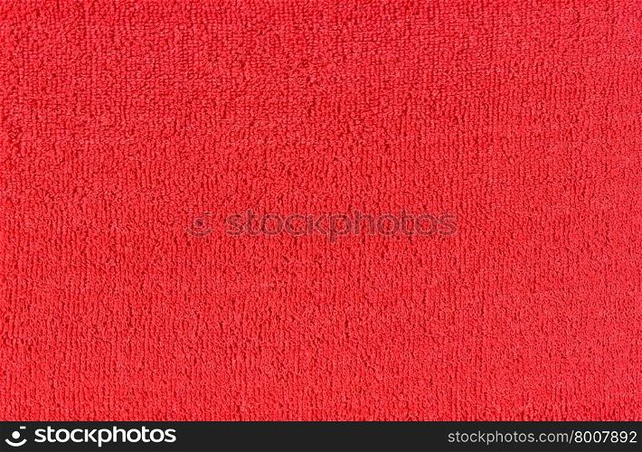 Texture of red fabric. Texture red of soft tissue fibers. Close-up.