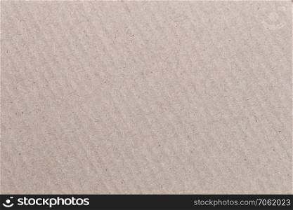 Texture of the brown paper box or cardboard for the design background.