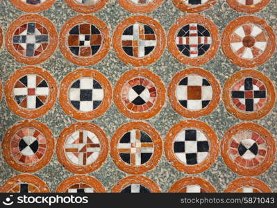 texture of the geometric tracery on the antique floor