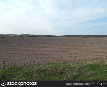 Texture of the land plowed by a plow field