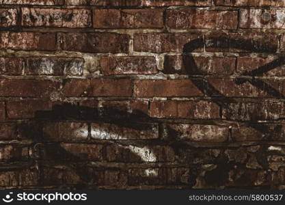 Texture of the old red brick wall closeup