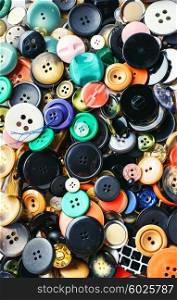 Texture of variety of buttons from clothing.Top view. texture of the buttons