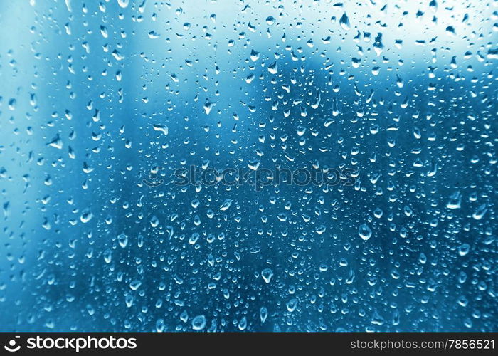 Texture of water drops on glass