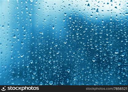 Texture of water drops on glass