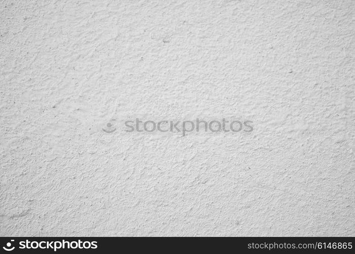 Texture of white painted concrete wall closeup