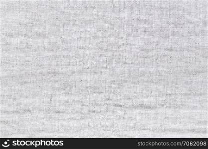 Texture of white raw fabric for the background design and rough surface of the cloth used for cleaning.