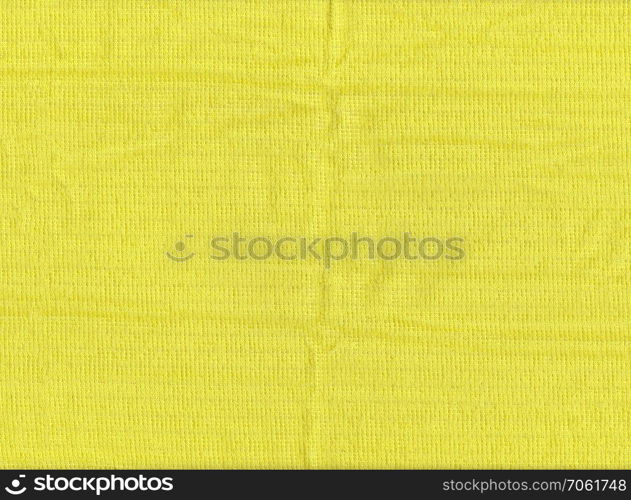 Texture of yellow fabric or surface of textiles in close up picture for the design background.