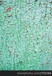 Texture peeled off paints. A wooden surface, green colour