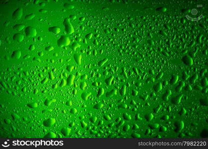 Texture water drops on the bottle of beer.