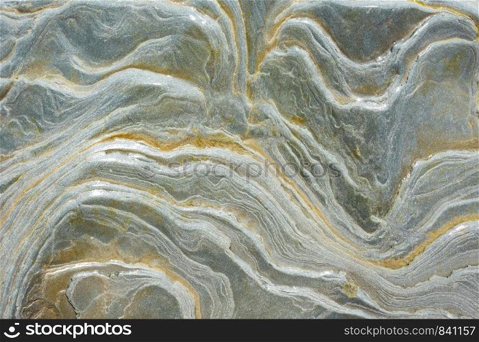 Texture - wet sea stone, with stains reminiscent of a wave