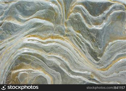 Texture - wet sea stone, with stains reminiscent of a wave