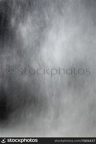 texture with flying small particles of white wheat flour dust, abstract background