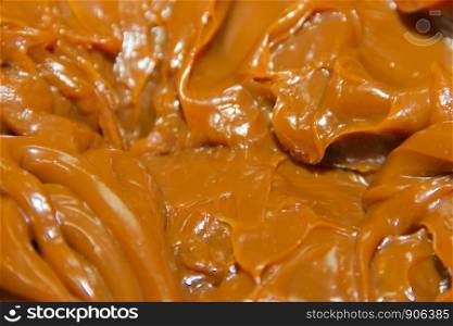 textured background of Argentinean dulce de leche