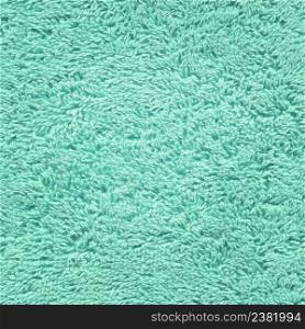 Textured fabric mint towel background. Turquoise mint towel texture. Textured fabric background in mint color