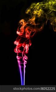 textured of colorful incense smoke on dark background