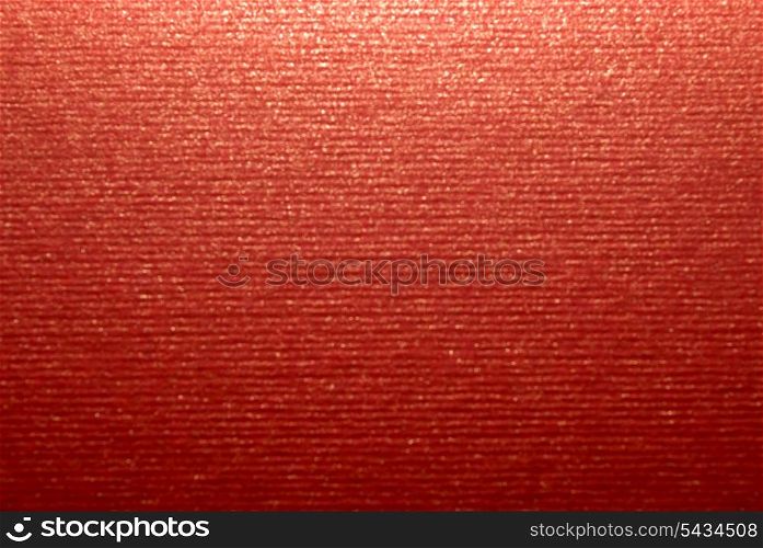 Textured red paper with gold shine