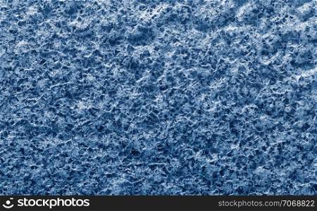 Textures and backgrounds: abstract winter pattern, seasonal background. Flat surface, covered with ice-like crystals of dried salt.. Abstract winter pattern