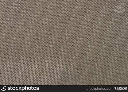 Textures, patterns and backgrounds concept. Industrial wavy gray tinware in honeycomb shape. Industrial wavy gray tinware