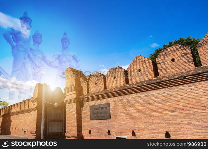 Tha Phae Gate Chiang Mai old city ancient wall and of Three Kings Monument Builders abstract background in Chiang Mai Northern Thailand.