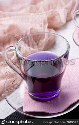 Thai blue, Butterfly pea tea on serving napkins with scarf. life style concept. close up