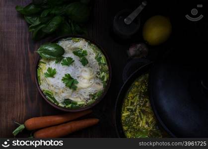 Thai chicken noodle soup, dark moody still life