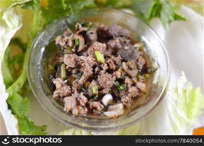 Thai dish of spicy minced pork eaten with vegetable