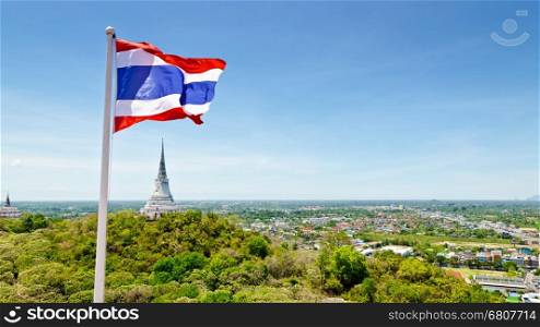 Thai flag waving on mountain in Phra Nakhon Khiri temple, archaeological site of Phetchaburi Province, Thailand&#xA;