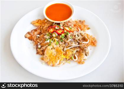 thai food call HOYTOD from fried shell with egg and ingredient