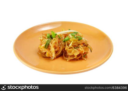 Thai food Pad thai , Stir fry noodles on orange dish