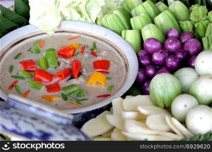 thai food, stew mackerel with coconut milk dip with fresh vegatables