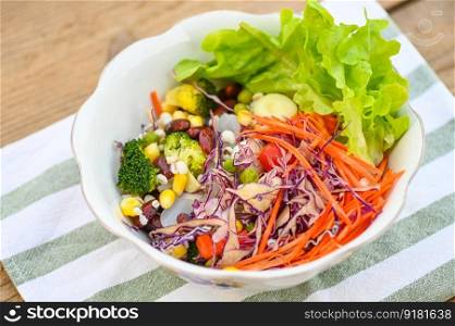 Thai food vegetable salads on salads bowl with fresh vegetable fruit nuts and grains for healthy food mixed vegetable salad vegetarian green and colorful food for breakfast - top view