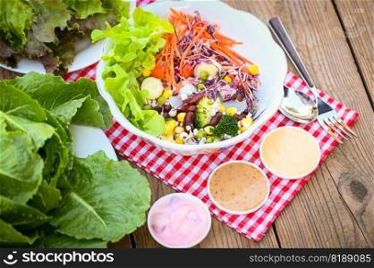 Thai food vegetable salads on salads bowl with salad dressing fresh vegetable fruit nuts and grains for healthy food mixed vegetable salad vegetarian green and colorful food for breakfast