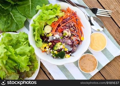 Thai food vegetable salads on salads bowl with salad dressing fresh vegetable fruit nuts and grains for healthy food mixed vegetable salad vegetarian green and colorful food for breakfast 