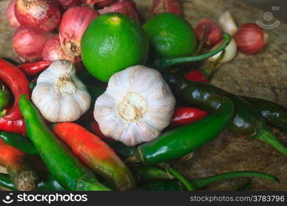 thai kitchen food spice herb pepper red onion garlic for cooking on top wood table