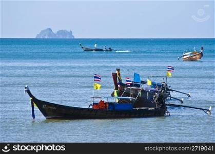 thai long boats in the Andaman Sea