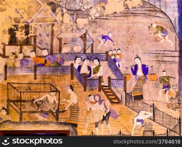 Thai mural painting depicts the way of life of Nan people in the past in Wat Phumin, north of Thailand
